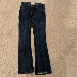 Dark wash Current Elliott jeans with a slight flare